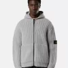 Kapuzenpullover mit Reißverschluss, Taschen und Fischerrippenmuster.