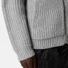Kapuzenpullover mit Reißverschluss, Taschen und Fischerrippenmuster.